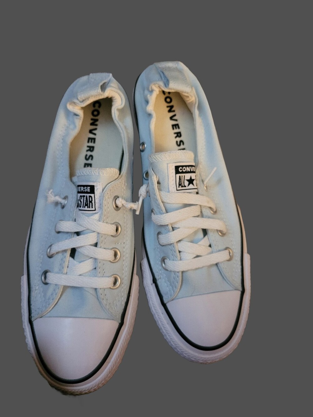 Converse Low Top Sneakers in Light Blue With White and Black Trim